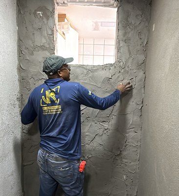 Aplicação de chapisco e reboco